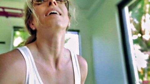Cory Chase blonde MILF smiling in steamy workout tank top