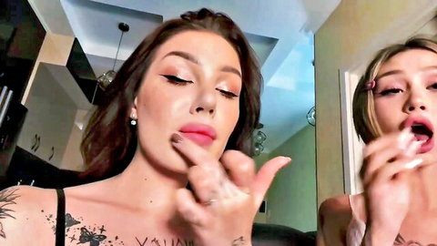 Brunette shemale and blonde sucking fingers seductively