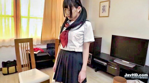 Cute Asian schoolgirl in uniform with pigtails and glasses in solo JAV tease