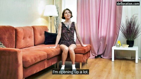 Aziza Rust exposing perky tits in open dress, seductive pose