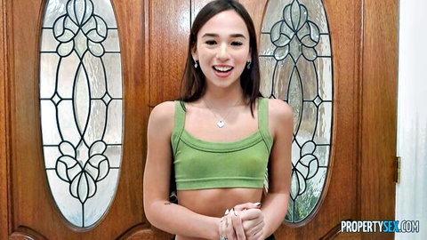 Dakota Tyler smiling in green crop top, petite influencer vibe