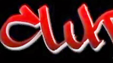 Glowing red neon CLUB sign on black background