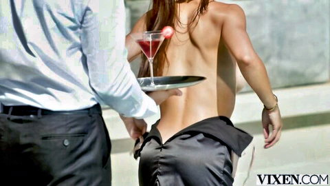 Topless brunette babe with bare back and ass served martini by suited man