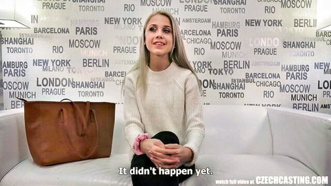 Blonde Czech amateur smiles in white sweater during POV casting interview