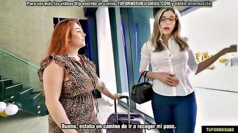 Chloe Cooper redhead in floral top meets blonde glasses friend at airport