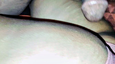 Blurry close-up of pale skin folds and juicy ass crack with thong strap