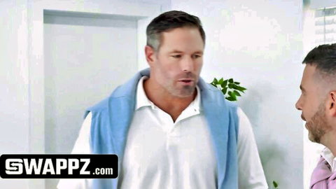 Two athletic men in casual shirts discuss before stepdaughter massage scene