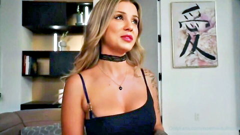 Noemie Dufresne blonde beauty in low-cut black top and choker necklace