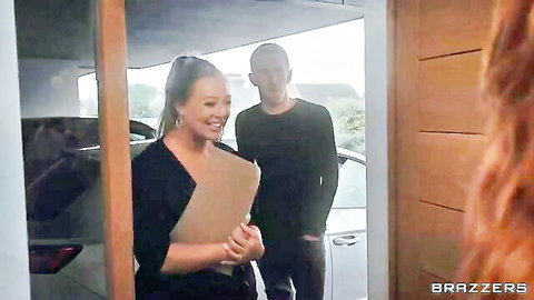 Busty Asian MILF in black dress holds clipboard, smiles at man outdoors