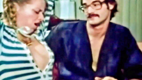 Vintage XXX scene with Babette, perky blonde in pigtails showing natural cleavage
