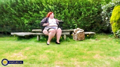 Curvy British MILF Missy teases in lingerie and high heels outdoors