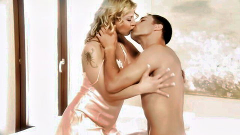 Grace and For passionately kiss in steamy embrace, blonde in lingerie hugging topless man
