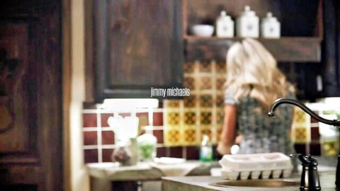 Sadie Summers blonde MILF in green dress at kitchen sink