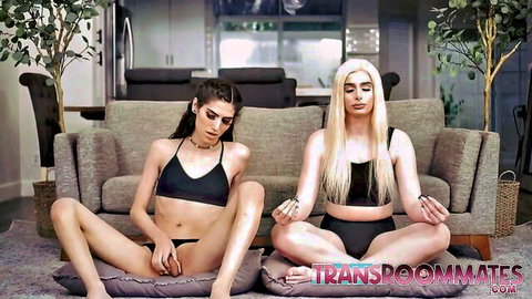 Zariah Aura and Ivory Mayhem trans roommates in seductive sofa meditation pose