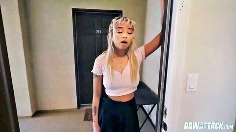 Gia petite blonde in white crop top and black mini skirt by door