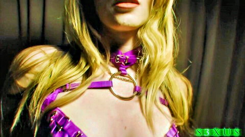 Ashley Lane in seductive purple BDSM harness and collar, blonde bombshell tease