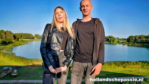 Vera Serephina with bald partner outdoors by Dutch lake