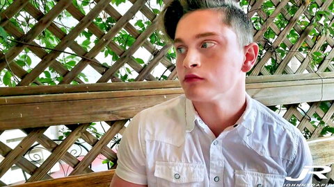 Johnny Rapid in white shirt, seductive outdoor pose for gay jock fans