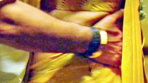 Mallu hotwife in yellow saree with exposed midriff, embraced by hubby in cuckold scene