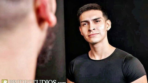 Marco Lorenzo smirks in mirror at bearded stud in tight black shirt