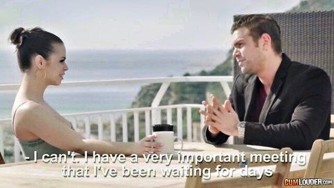 Nekane Sweet in flirty morning chat with suited man on seaside balcony