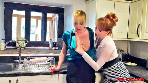 Busty blonde and redhead in sexy blouses and skirts fondle breasts intimately