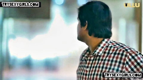 Handsome Indian secretary profile in checkered shirt, office tease
