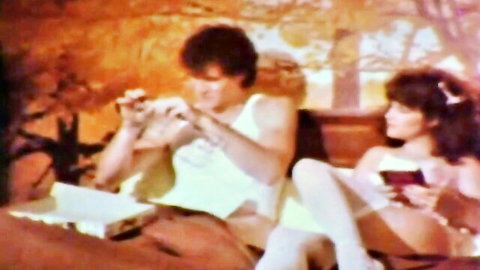 Vintage couple in outdoor tease with white lingerie and stockings