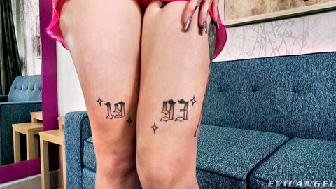 Tattooed thighs tease in pink skirt for ultimate anal adventure