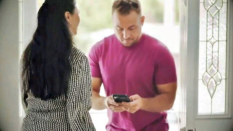 Dana Vespoli in teasing doorway chat with muscular man on phone