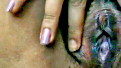 Sexy Indian MILF spreads her hairy pussy for close-up view