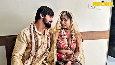 Teju in revealing red blouse showing deep cleavage with Ujjawalguy in traditional Indian wedding attire