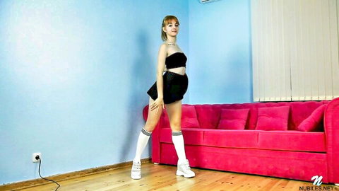 Marta Lovely teasing in black crop top, mini skirt, and white thigh socks