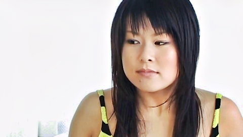 Asian woman in yellow bikini, seductive gaze from Sky Angel Vol 15 JAV
