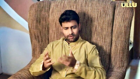 Bearded Indian man in yellow kurta gesturing in ULLU adult promo