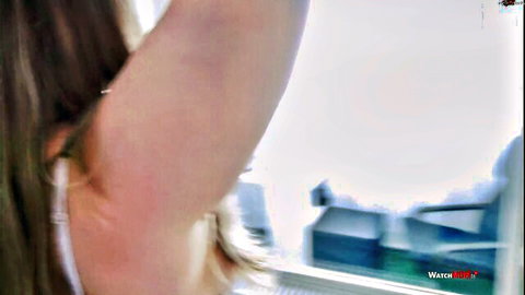 Sexy brunette exposes smooth shaved armpit in closeup POV