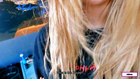 Surprised blonde babe in black tee with long messy hair and 'What is this pound?' text overlay
