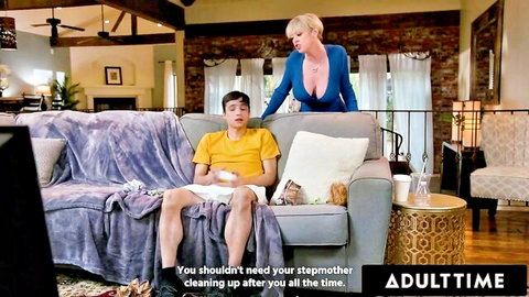 Dee Williams as busty blonde stepmom teases stepson on couch