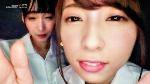 Two sexy Japanese girls in white shirts tease with tongue out and flirty smiles craving pussy licks