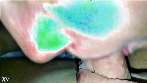Messy closeup of woman's open mouth with cum dripping from thick cock after blowjob