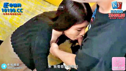 Asian woman passionately kissing man's neck while gripping his chest in intimate clothed tease