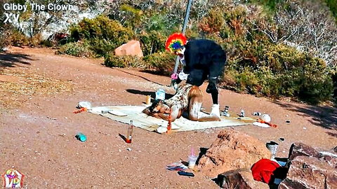 Gibby The Clown fucks nude woman in outdoor clown fetish scene