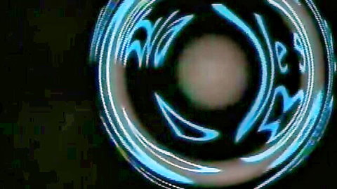 Mesmerizing cyan blue swirling vortex hypnotic pattern with glowing center