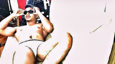 Hairy Asian man in white briefs, lounging shirtless with bulge visible