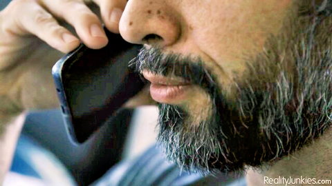 Bearded man on intense phone call in Lexi Luna hotwife scene