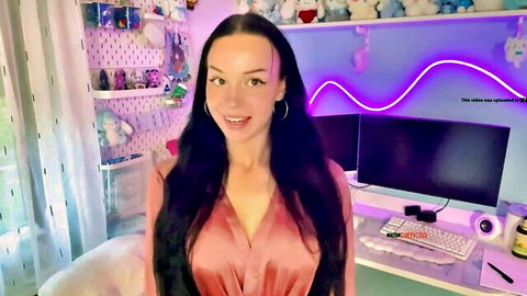 Cassandra Clasen seductive solo in pink satin dress, cleavage tease