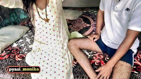 Hot South Asian couple on bed, Indian babe in polka dot dress spreads legs as boyfriend gropes her thigh