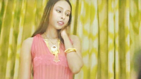Sexy South Asian Indian babe in tight pink tank top showing cleavage seductively