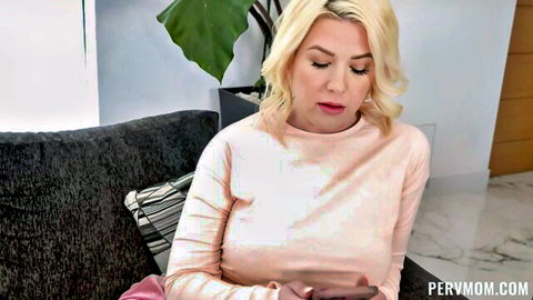 Kit Mercer blonde MILF in pink top, seductive close-up gaze