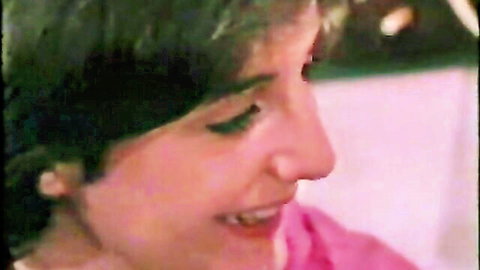 Smiling Euro teen with short hair in retro adult video thumbnail